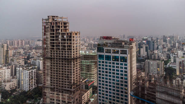 An under construction skyscrapers and sounding buildings! Due to the economic development of Bangladesh, there are many small and big buildings under construction. The photo was taken from Gulshan in the evening.